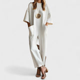 Emmy - Elegancki kombinezon z krótkim rękawem