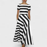 Emma – Lekka i zwiewna sukienka w cienkie paski